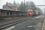 CSX 911 leads M404